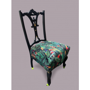 Victorian nursing chair reupholstered in Amazon jungle printed velvet and detailed with 18ct gold leaf