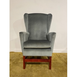 Contemporary green upholstered wing back chair