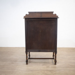 Narrow Oak Chest of Drawers with Art Deco Carving