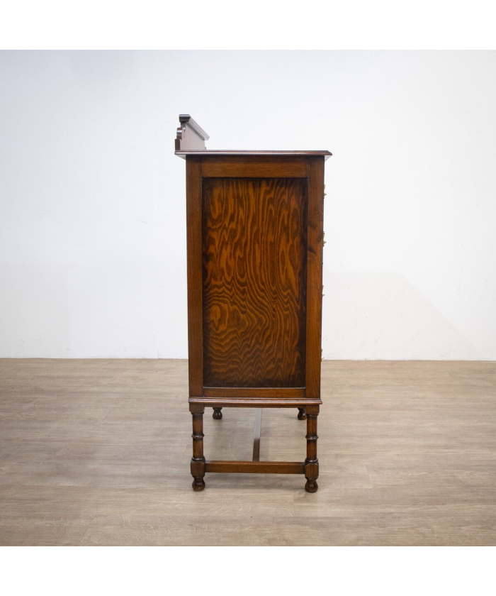 Narrow Oak Chest of Drawers with Art Deco Carving