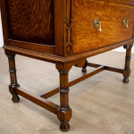 Narrow Oak Chest of Drawers with Art Deco Carving