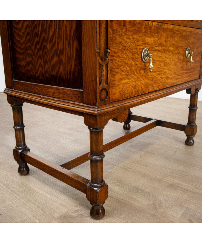 Narrow Oak Chest of Drawers with Art Deco Carving