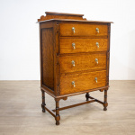 Narrow Oak Chest of Drawers with Art Deco Carving