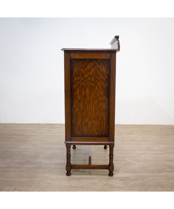 Narrow Oak Chest of Drawers with Art Deco Carving