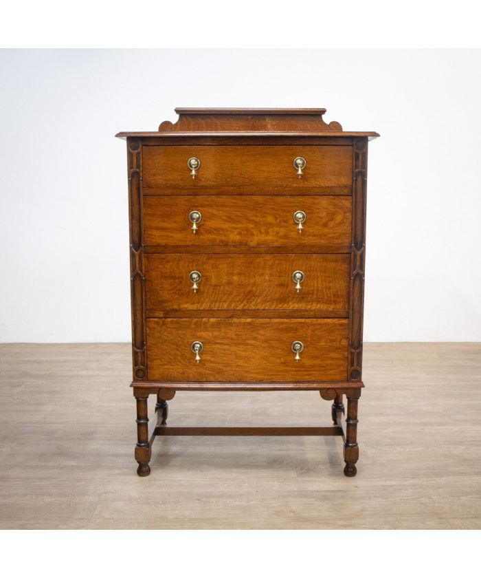 Narrow Oak Chest of Drawers with Art Deco Carving