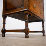 Narrow Oak Chest of Drawers with Art Deco Carving