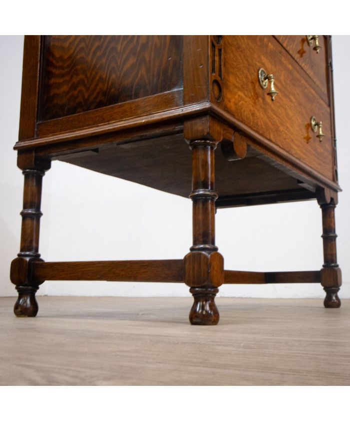 Narrow Oak Chest of Drawers with Art Deco Carving
