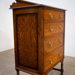 Narrow Oak Chest of Drawers with Art Deco Carving