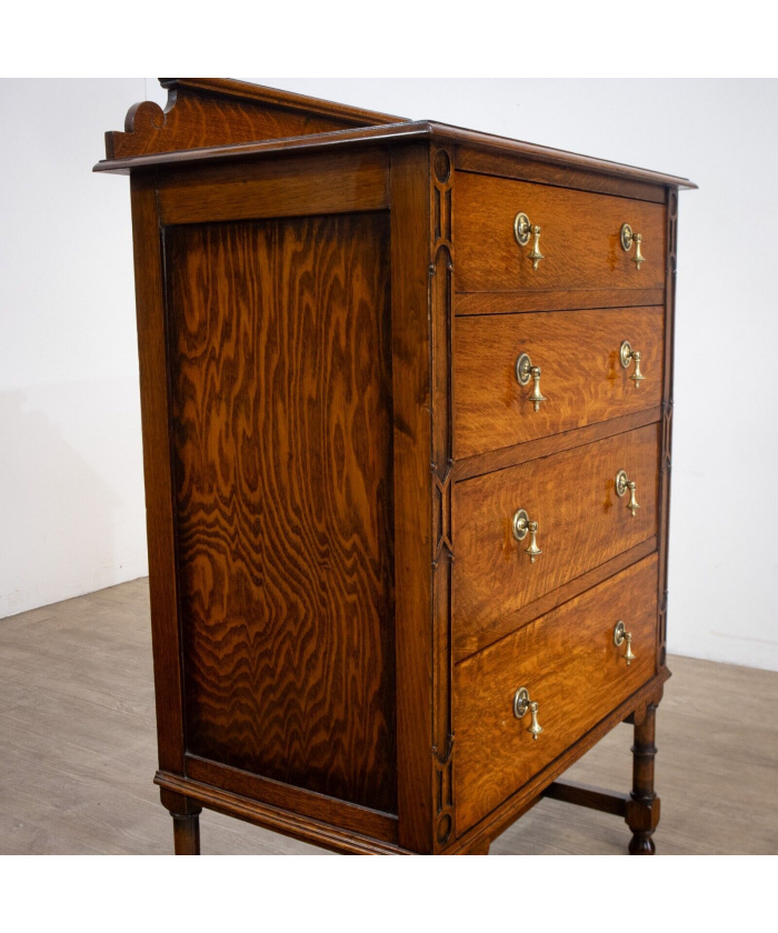 Narrow Oak Chest of Drawers with Art Deco Carving