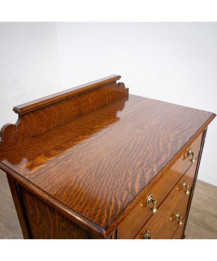 Narrow Oak Chest of Drawers with Art Deco Carving