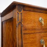 Narrow Oak Chest of Drawers with Art Deco Carving