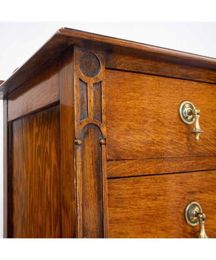 Narrow Oak Chest of Drawers with Art Deco Carving