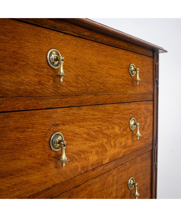 Narrow Oak Chest of Drawers with Art Deco Carving