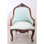Antique upholstered walnut armchair