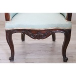 Antique upholstered walnut armchair