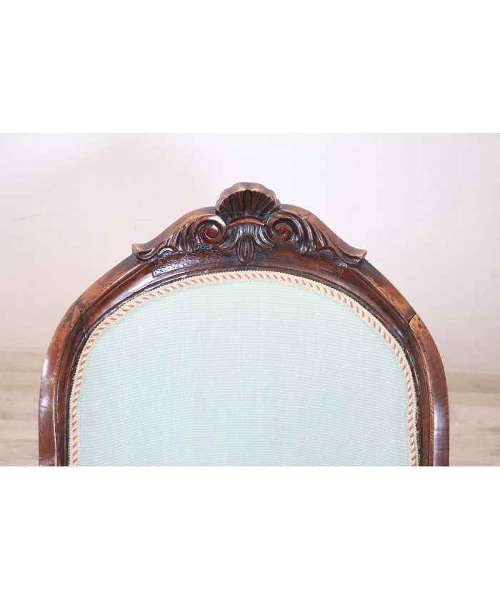 Antique upholstered walnut armchair