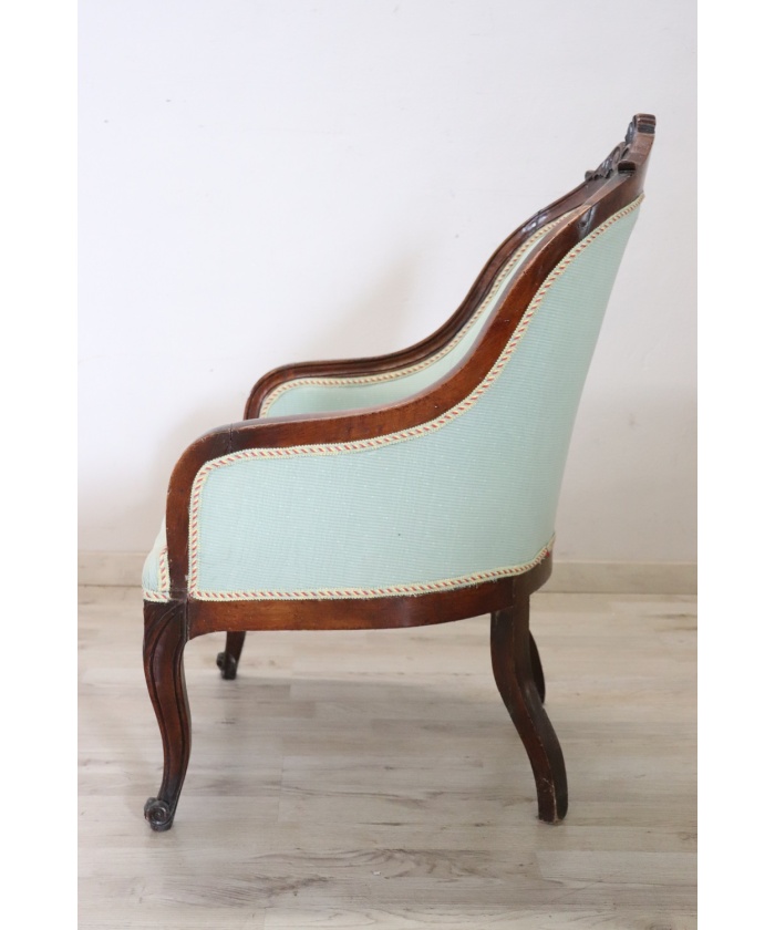 Antique upholstered walnut armchair