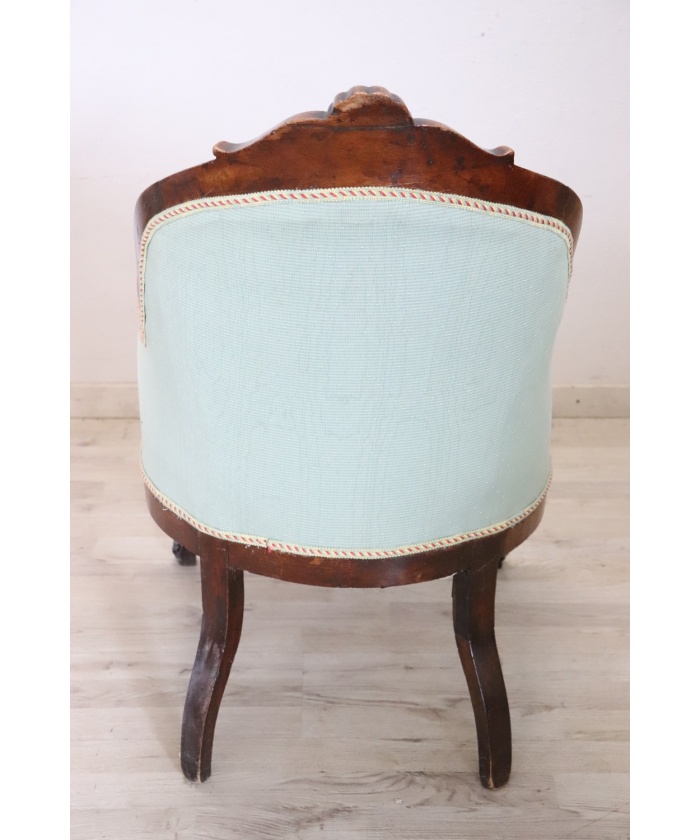 Antique upholstered walnut armchair