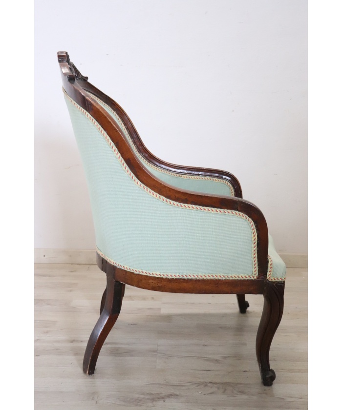 Antique upholstered walnut armchair
