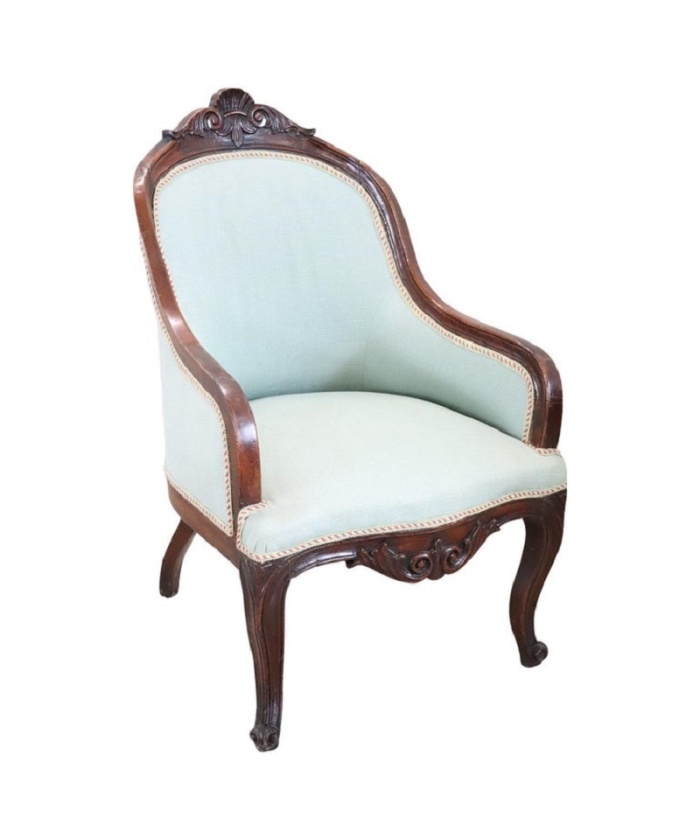 Antique upholstered walnut armchair