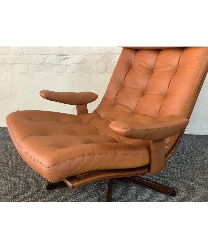 Gote Mobler Leather Reclining Swivel Chair.