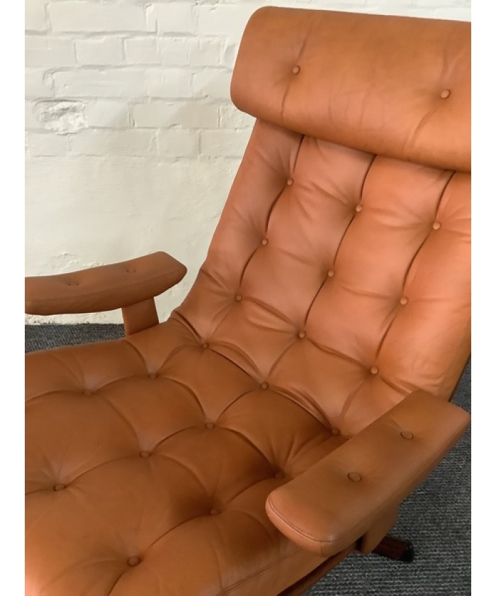 Gote Mobler Leather Reclining Swivel Chair.
