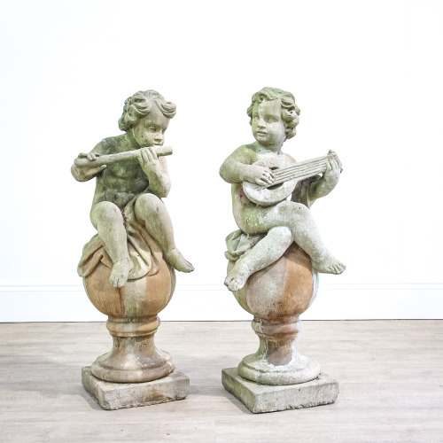Pair of Weathered Garden Putti or Cherubs